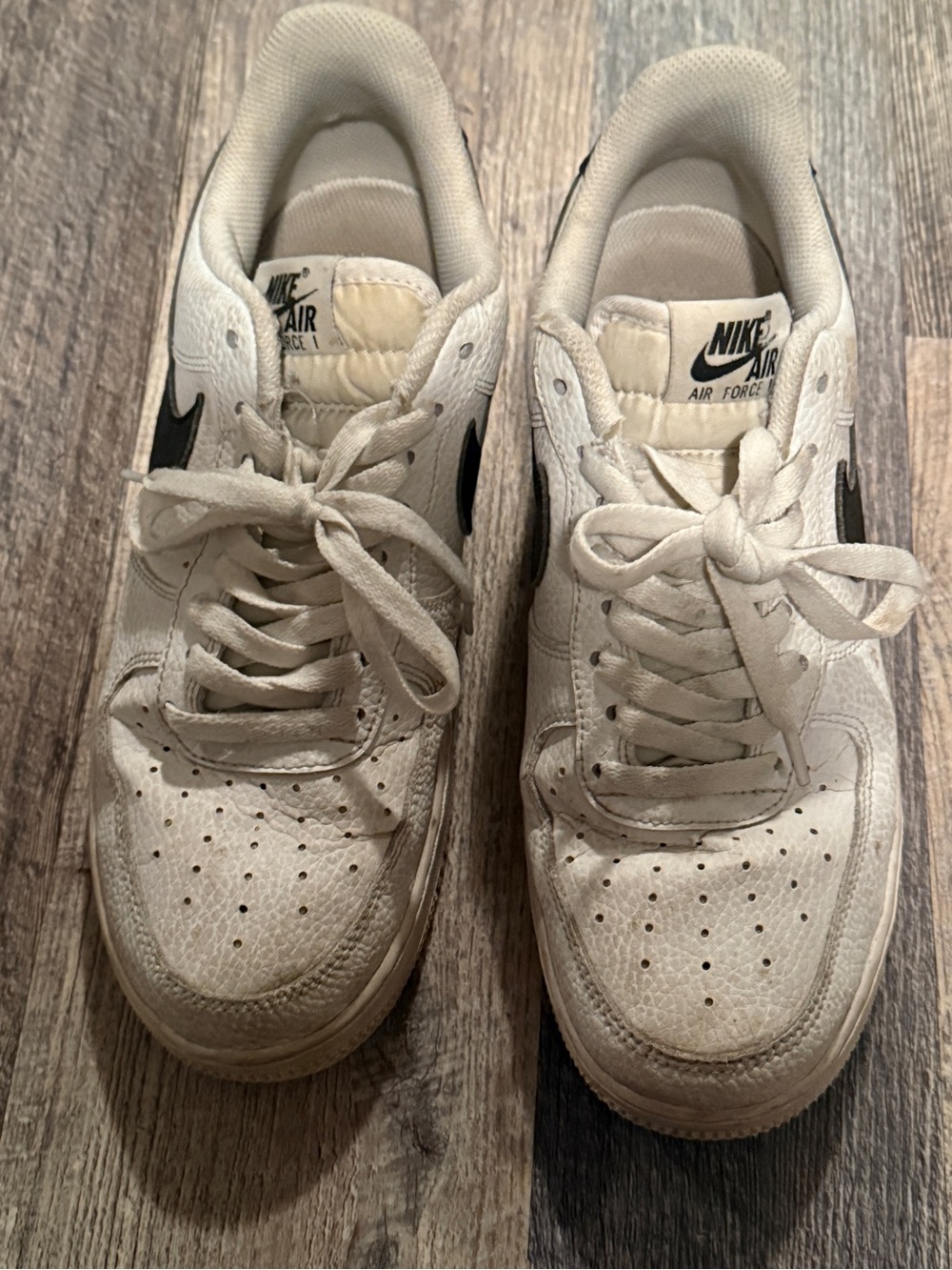 Nike Air Force 1 White Sneakers with Black Swoosh